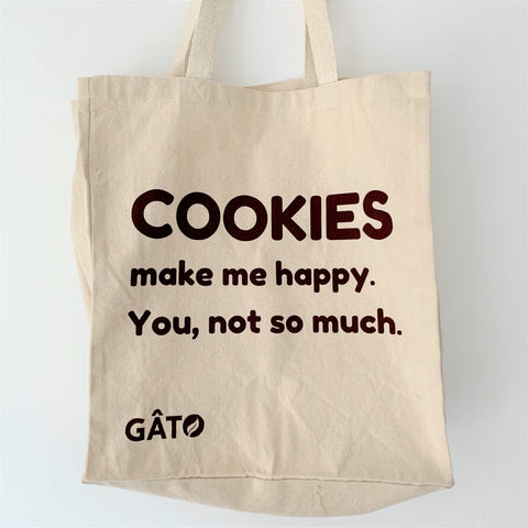 large tote bag with slogan 'cookies make me happy. you, not so much.'